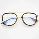 Freyrs Weston round unisex blue light reading glasses with tortoiseshell frames and gold bridge.