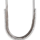 Silver crystal snake chain necklace with two intertwined strands, one featuring a sleek metal design and the other adorned