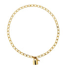Gold Paddington lock necklace with a thick, chunky chain and a small padlock pendant with a T-bar closure.