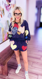 QUEEN OF SPARKLES NAVY MULTI EMBROIDERED HEARTS SWEATSHIRT - Tops