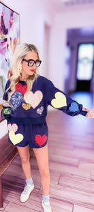 QUEEN OF SPARKLES NAVY MULTI EMBROIDERED HEARTS SWEATSHIRT - Tops